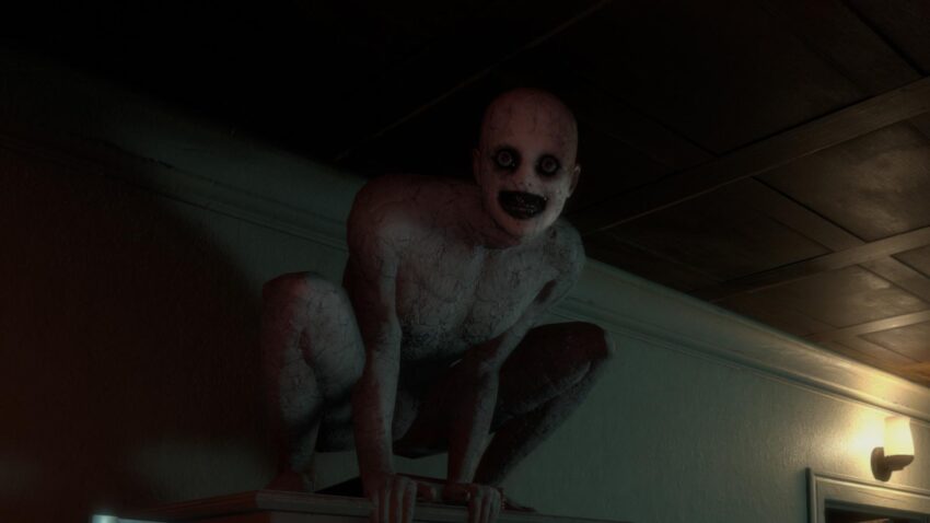 The Mortuary Assistant - an eerie creature stares into the camera