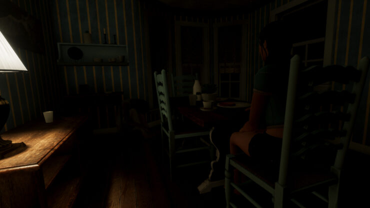 Silent Still 2 - A woman sits at a table eating toast in a room lit by a single lamp.